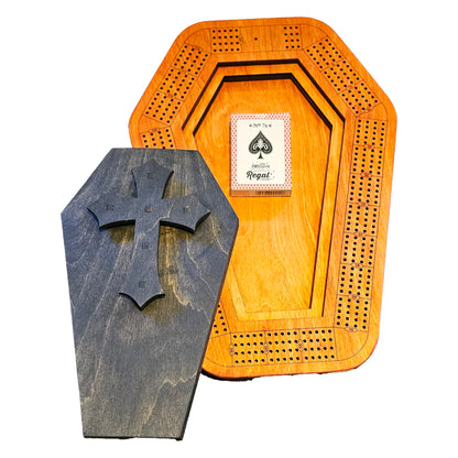 coffin cribbage board with lid off and deck of cards